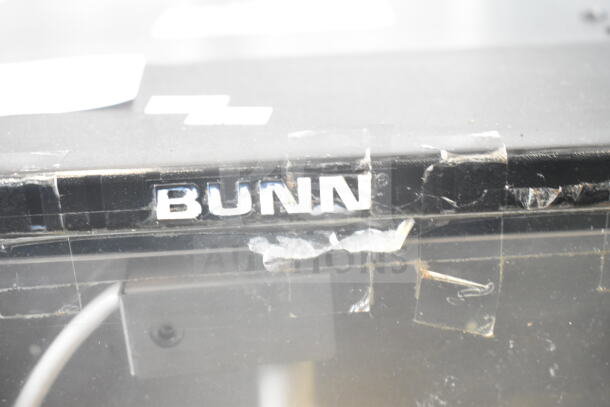 Bunn FMD DBC-3 commercial cappuccino machine with visible logo. Condition shows signs of wear. 120/240V, 1 Phase.