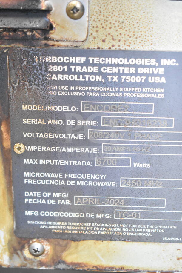 2024 Turbochef Encore2 rapid cook oven plate displaying model, voltage, and manufacturing details. Good condition.