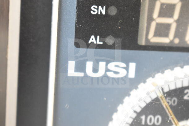 Lusi YCO-4-16D commercial oven display panel showing brand and model details.