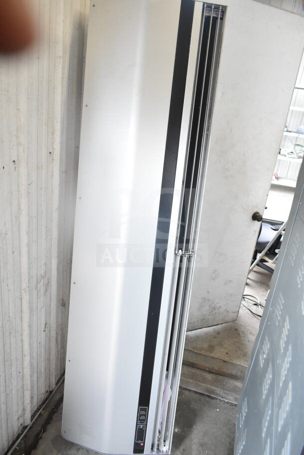 Berner ADL-1 Commercial Air Curtain, 208V, 3 Phase, in white with black trim, used condition.