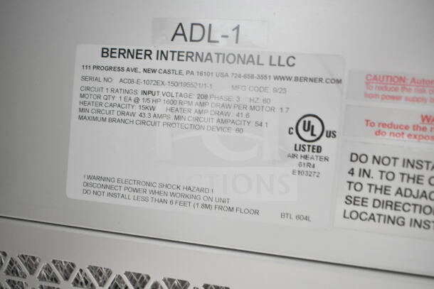 Berner ADL-1 Commercial Air Curtain, 208 volts, 3 phase, features label detailing electrical specs and warnings.
