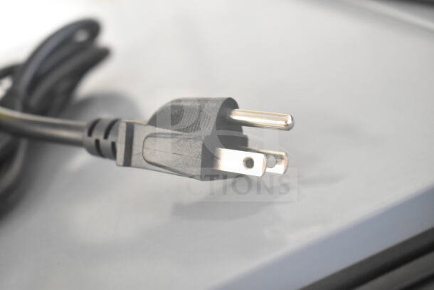 Power cord of Vollrath 7411 commercial soup kettle food warmer, showing standard 120-volt plug connection.