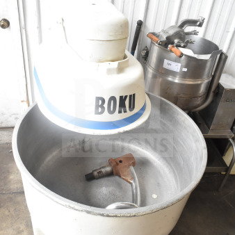 Boku commercial spiral mixer with mixing bowl, dough hook attachment, and 120/208-240 volts label. Durable condition.