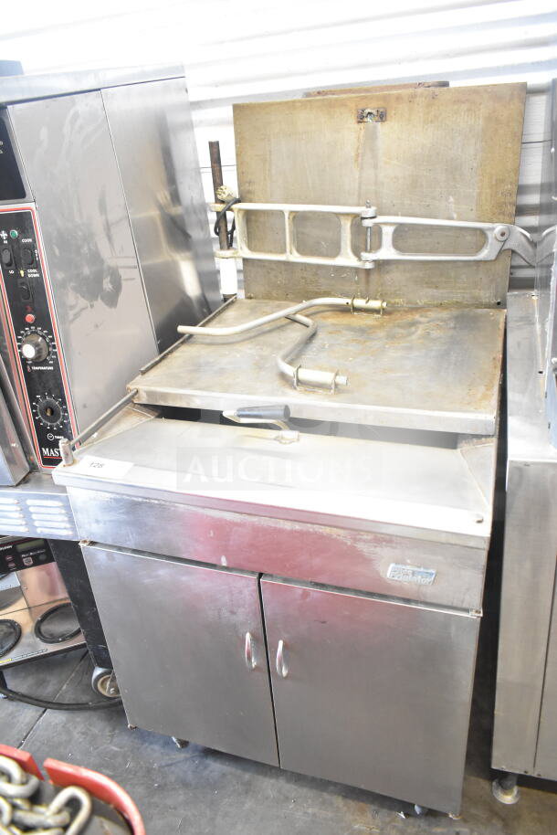 Pitco Frialator commercial donut fryer with dough dropper arm and plunger, 120,000 BTU, stainless steel body, used condition.
