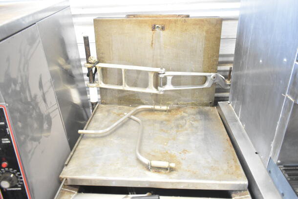 Pitco Frialator commercial natural gas donut fryer with dough dropper arm and plunger, 120,000 BTU, visible signs of use.