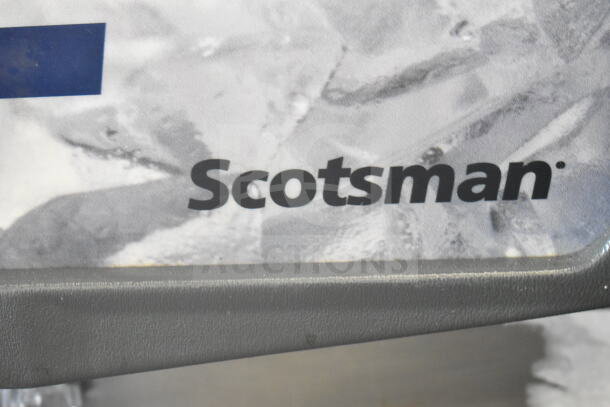 Scotsman Commercial Ice Dispenser with 115 Volts, 1 Phase. Visible brand logo, suitable for commercial use.