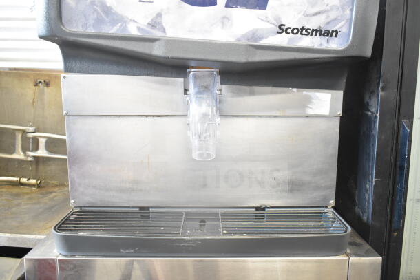 Scotsman Commercial Ice Dispenser, 115V, 1 Phase, stainless steel, visible branding, used condition.