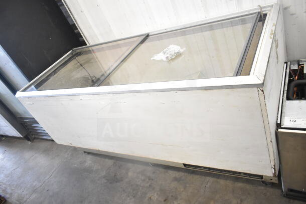 Chest Freezer Merchandiser, glass top, used condition, 115 volts, 1 phase, visible wear, ideal for commercial display.