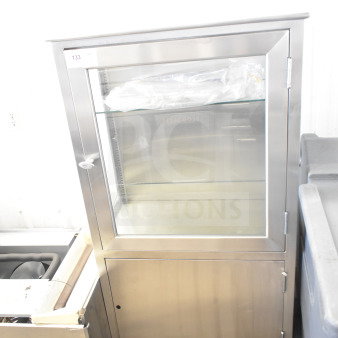 Shampaine Commercial Merchandising Cabinet, stainless steel, glass door, excellent condition, shelf inside, label number 133.