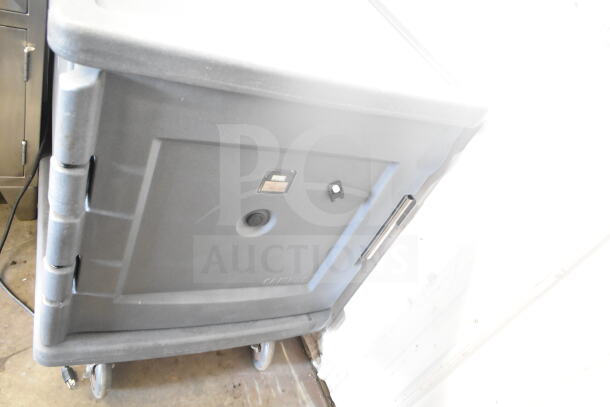 Cambro CMBHC1826L gray poly heated holding cabinet with commercial casters, features 120V, 1 phase power.