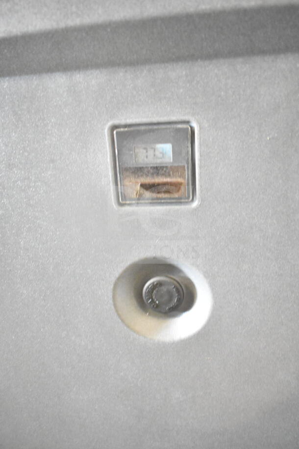 Cambro CMBHC1826L gray poly heated holding cabinet with commercial casters, displaying temperature gauge. 120 volts, 1 phase.
