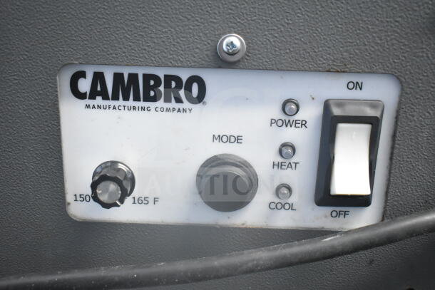 Cambro CMBHC1826L gray poly heated holding cabinet control panel, showing power, heat, and cool modes.