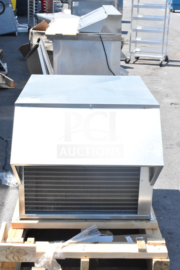 Brand new Master-Bilt MHHZ0353B commercial compressor, 200/230V, 1 phase, minor scratches and dents, on a pallet.
