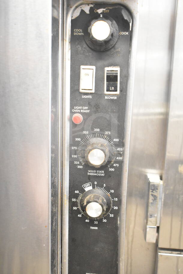 Blodgett commercial gas convection oven controls, featuring thermostatic dials, view-through doors, and timer settings.