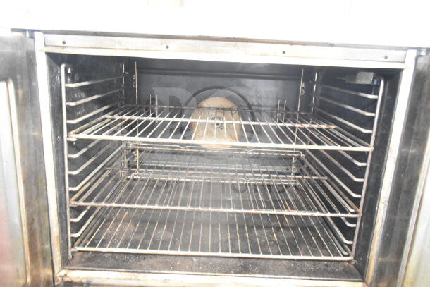 Blodgett commercial gas convection oven with view-through doors, thermostatic controls, interior racks, used condition.