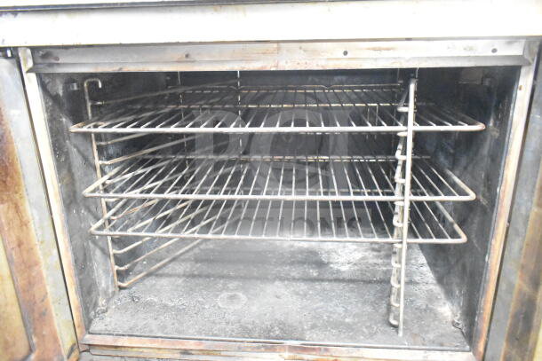 Blodgett commercial gas convection oven, full-size, with view-through doors, thermostatic controls, interior racks shown.