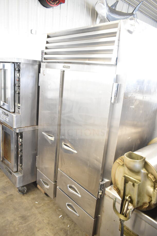 Traulsen RDT 2-24 DUT commercial reach-in with 2 doors, 2 drawers, stainless steel, 115V, 1 phase.