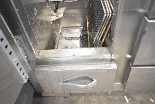Traulsen RDT 2-24 DUT Commercial Reach-In Cooler, stainless steel, 2 doors, 2 drawers, 115V, 1 phase, interior detail.