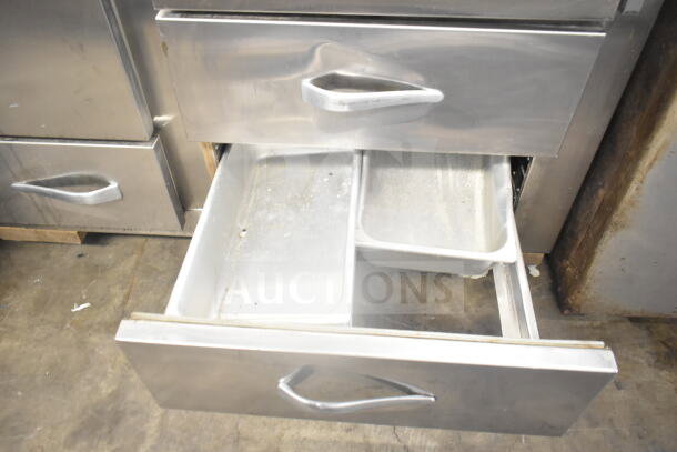 Traulsen RDT 2-24 DUT commercial reach-in fridge, two doors, two drawers, 115 volts, stainless steel, used condition.