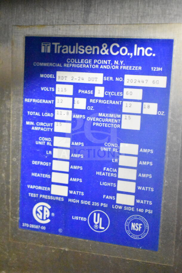 Traulsen RDT 2-24 DUT commercial fridge label, 115 volts, 1 phase, model and serial numbers, CSA, UL, and NSF logos.
