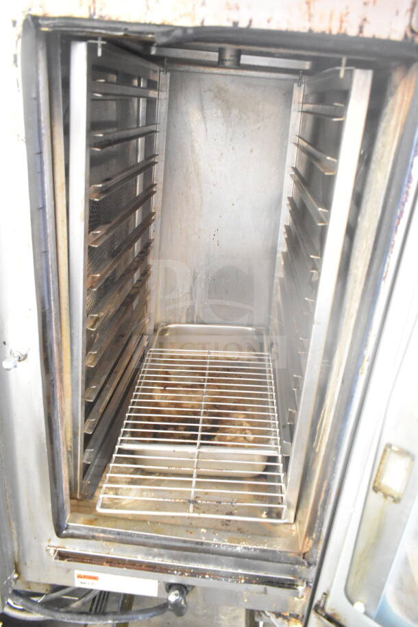 BKI TE101R Combi Convection Oven, electric, 208V, 3-phase on pan rack, visible interior shelving and slight wear.
