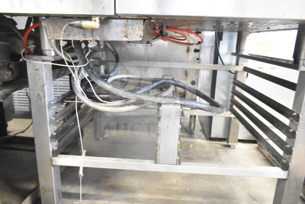 BKI TE101R Combiking Electric Combi Oven on Pan Rack, 208V, 3 Phase, visible wiring, metal frame, moderate wear.
