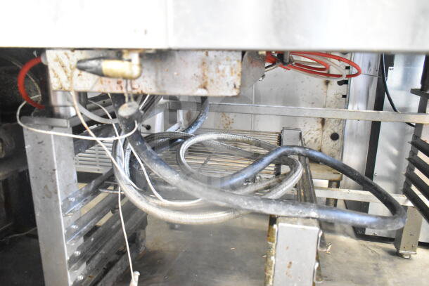 BKI TE101R Combiking electric combi convection oven, shown mounted on a pan rack. Visible wiring and components. 208V, 3 Phase.