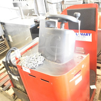 Raymond Deka 19-F60L Forklift, red, without forks, includes battery, visible labels, and control handle.