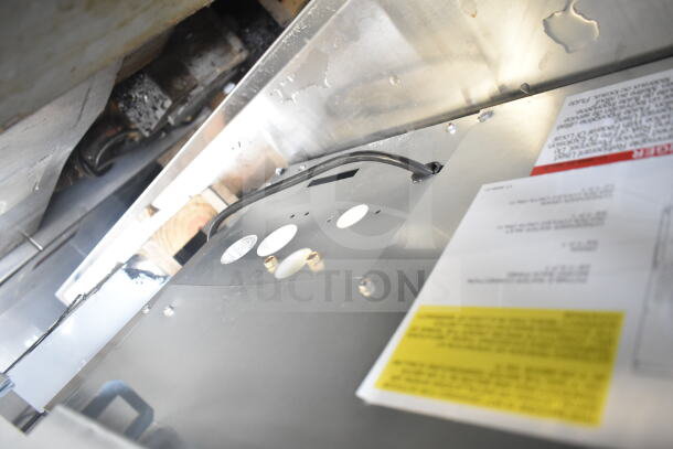 Brand new Scotsman UC2024MAX-1A ice machine, 227 lbs., 115V, minor scratches, labels with setup instructions visible.