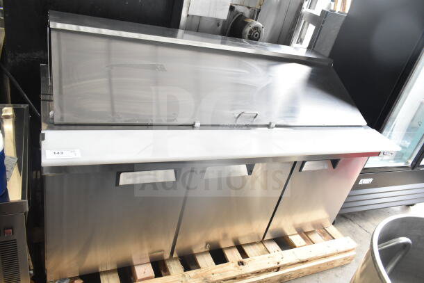 BRAND NEW Avantco 178APT71MHC commercial sandwich salad prep table, bain marie mega top, 115 Volts, 1 Phase, slight scratch and dent condition, stainless steel finish, on wooden pallet.