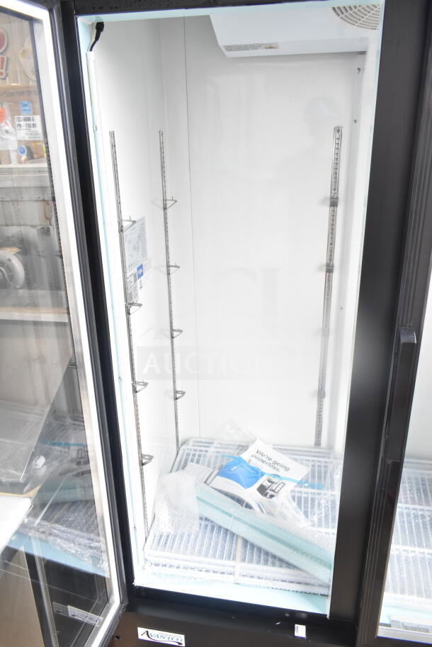 BRAND NEW Avantco 178GDC40HCB commercial fridge, black swing glass door, LED lighting, minor scratches, 115V, 1 Phase.