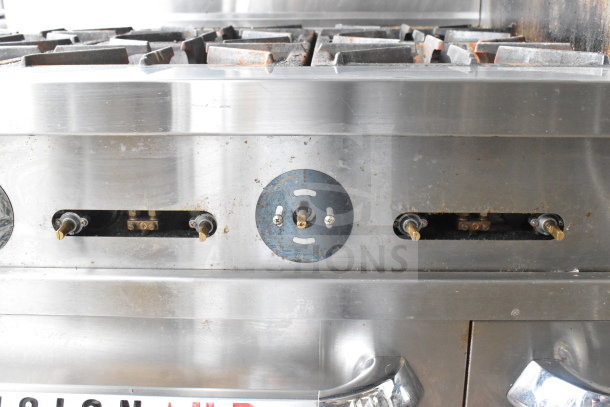 PrecisionHD 6 burner gas range with flat top griddle, 2 ovens, over shelf, backsplash, on casters. Stainless steel finish.