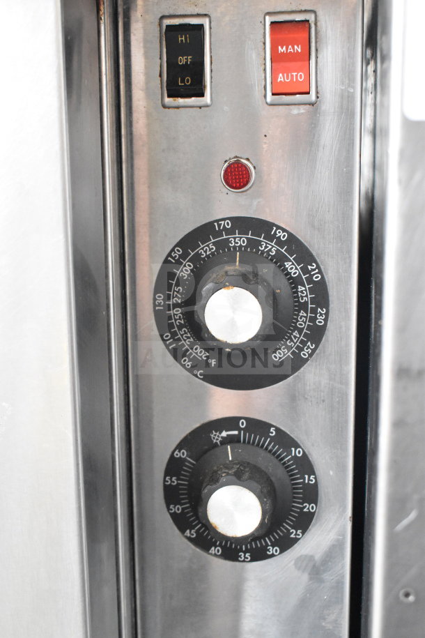 Blodgett commercial convection oven controls, featuring thermostatic knobs, "HI LO OFF" switch, and "MAN AUTO" indicator.