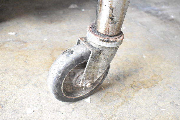 Blodgett convection oven metal caster in worn condition, showcasing durable construction for commercial use.