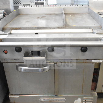 Southbend commercial gas flat top griddle with convection oven, on casters. Features control knobs and stainless finish. Used condition.