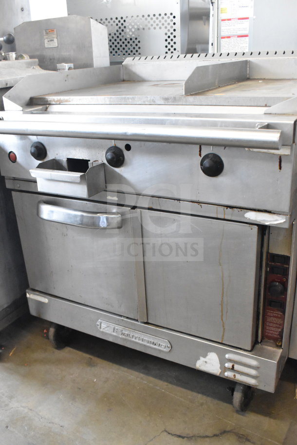 Southbend commercial gas-powered griddle with convection oven, featuring steel construction and mounted on casters. Slight wear visible.