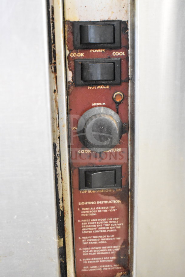Southbend commercial gas griddle with convection oven, control panel view. Visible wear and instructions label.