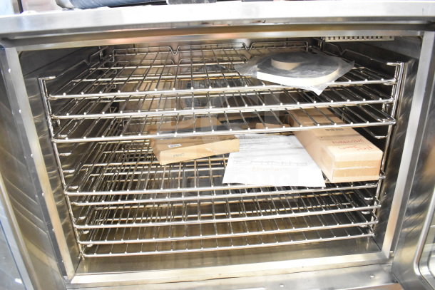 Cooking Performance Group commercial electric convection oven with view-through doors, five chrome racks, and accessories.