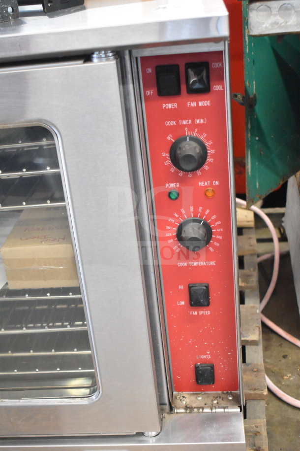 Cooking Performance Group commercial electric convection oven with view-through doors, thermostatic controls, and stainless steel exterior.