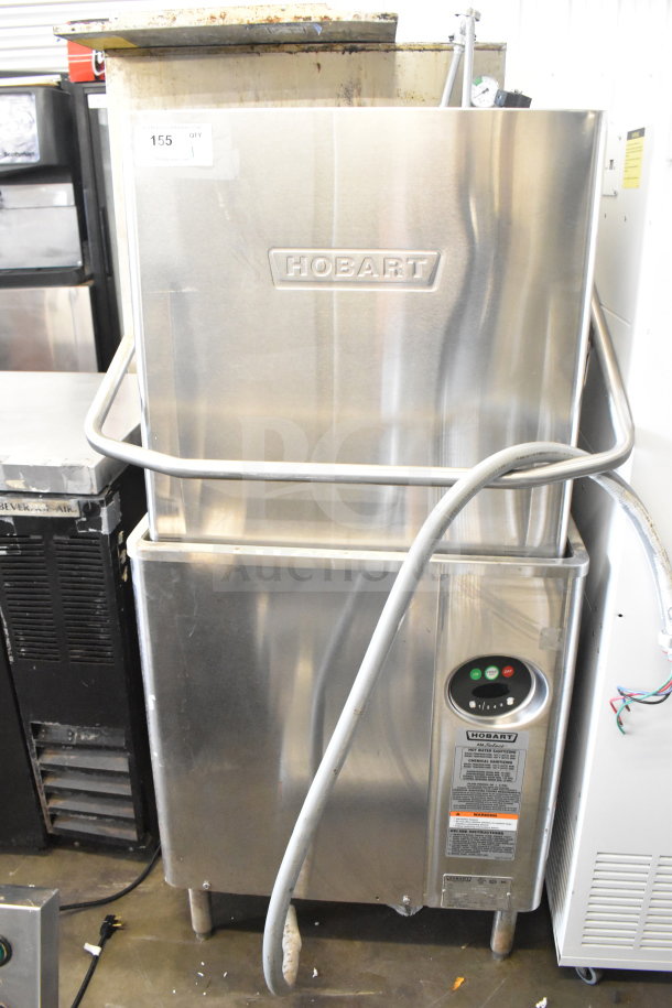 Hobart AM15 commercial dishwasher, corner pass-through, stainless steel, used condition, 208-240V, 3-phase.