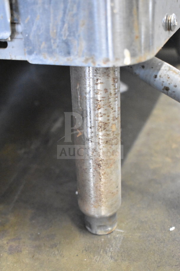 Hobart AM15 dishwasher leg showing signs of wear on the metal surface, part of commercial unit.