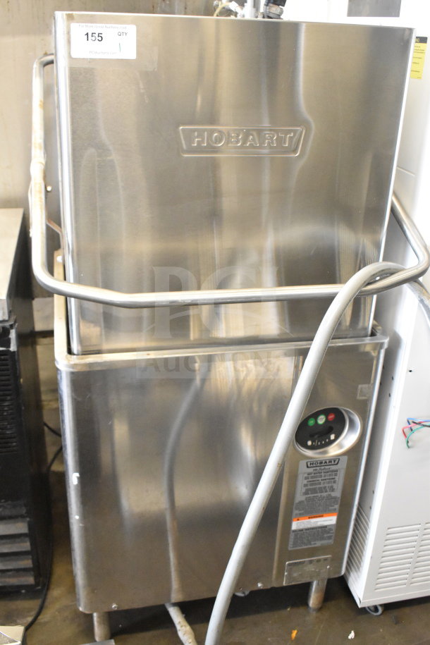 Hobart AM15 Commercial Dishwasher, stainless steel, corner pass-through style. Power: 208-240V, 3 Phase. Good condition.