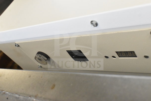 Johnson Controls Isoclean CM Commercial Air Filter, 120V, 1 Phase, with control panel featuring power switch and display.