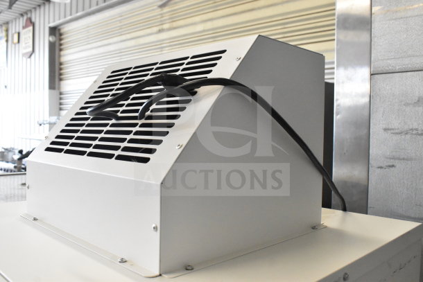 Johnson Controls Isoclean CM commercial air filter, 120V, 1 phase, shown on commercial casters, white casing, visible power cord.