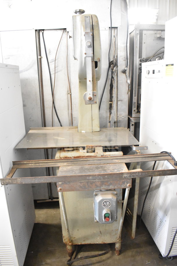 US Berkel Commercial Floor Style Meat Saw, 208 Volts, 3 Phase, showing signs of use. Includes original controls and markings.