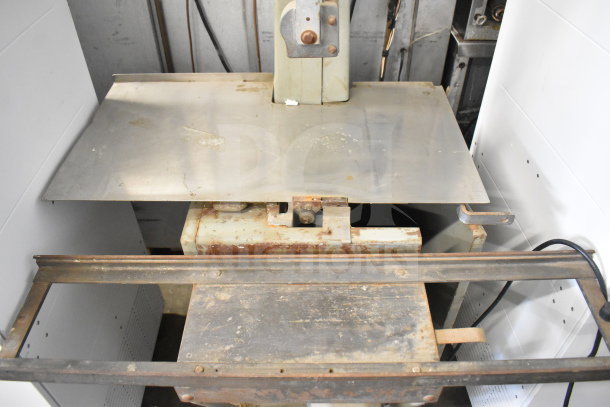US Berkel Commercial Floor Meat Saw, 208 Volts, 3 Phase, metal body, some wear, sturdy base, industrial use.