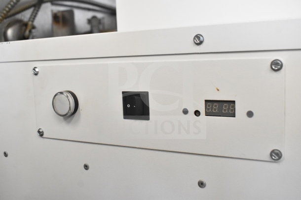 Johnson Controls Isoclean CM air filter control panel with knobs and digital display, showing slight wear, 120V, 1 Phase.