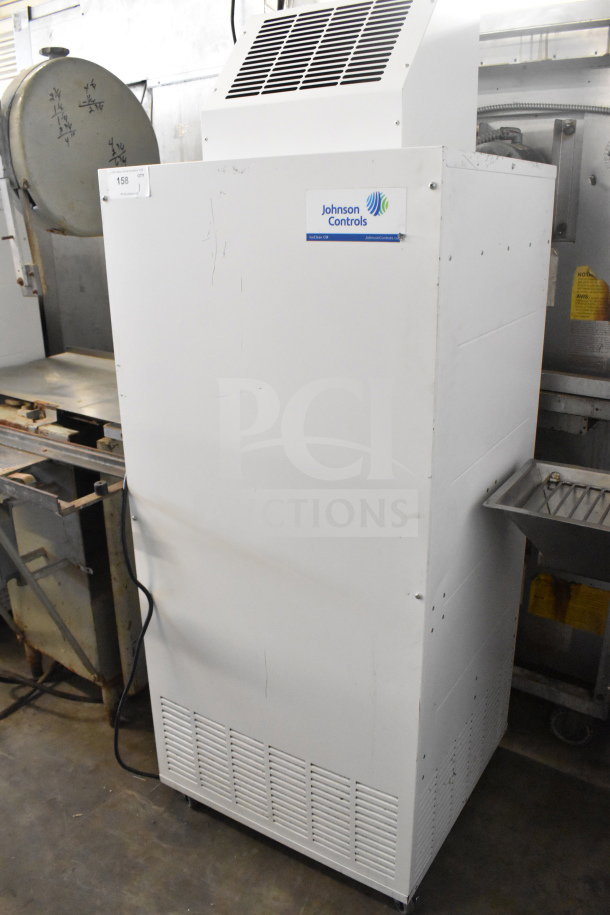 Johnson Controls Isoclean CM air filter on casters, 120V, 1 phase. White exterior with logo, used condition.