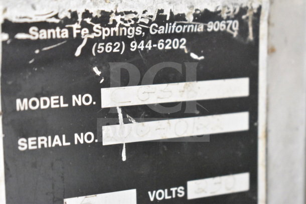 CG58 Commercial Floor Style Meat Mixer label, showing model CG58, 230 volts, 3 phase. Tag slightly worn but legible.