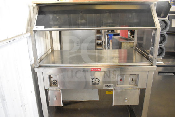 HCH Commercial Heated Buffet, stainless steel, on casters, with control panel and "Caution - Hot" label, used condition.